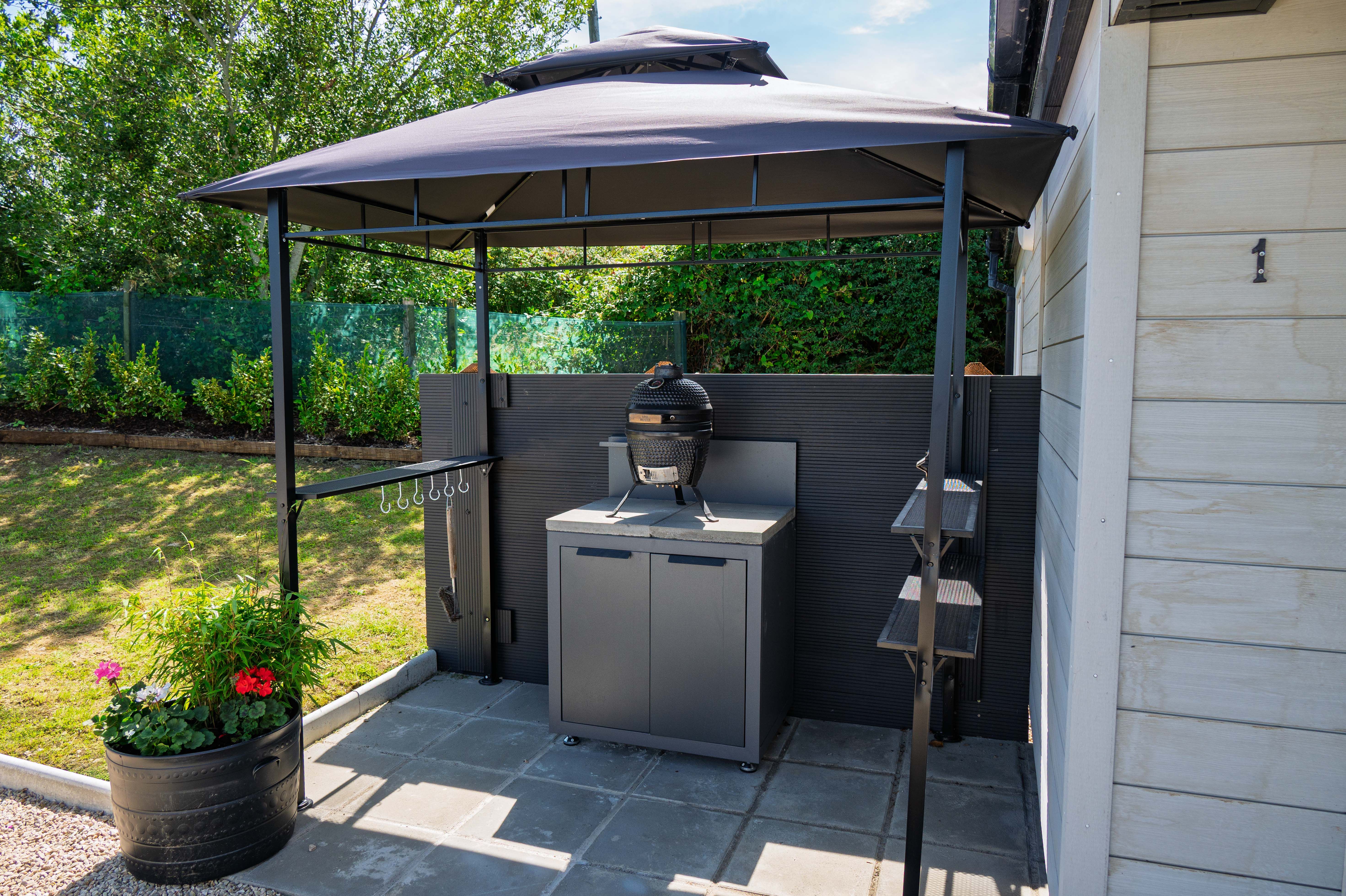 Rae’s BBQ pavilion with the ceramic-egg kamado grill