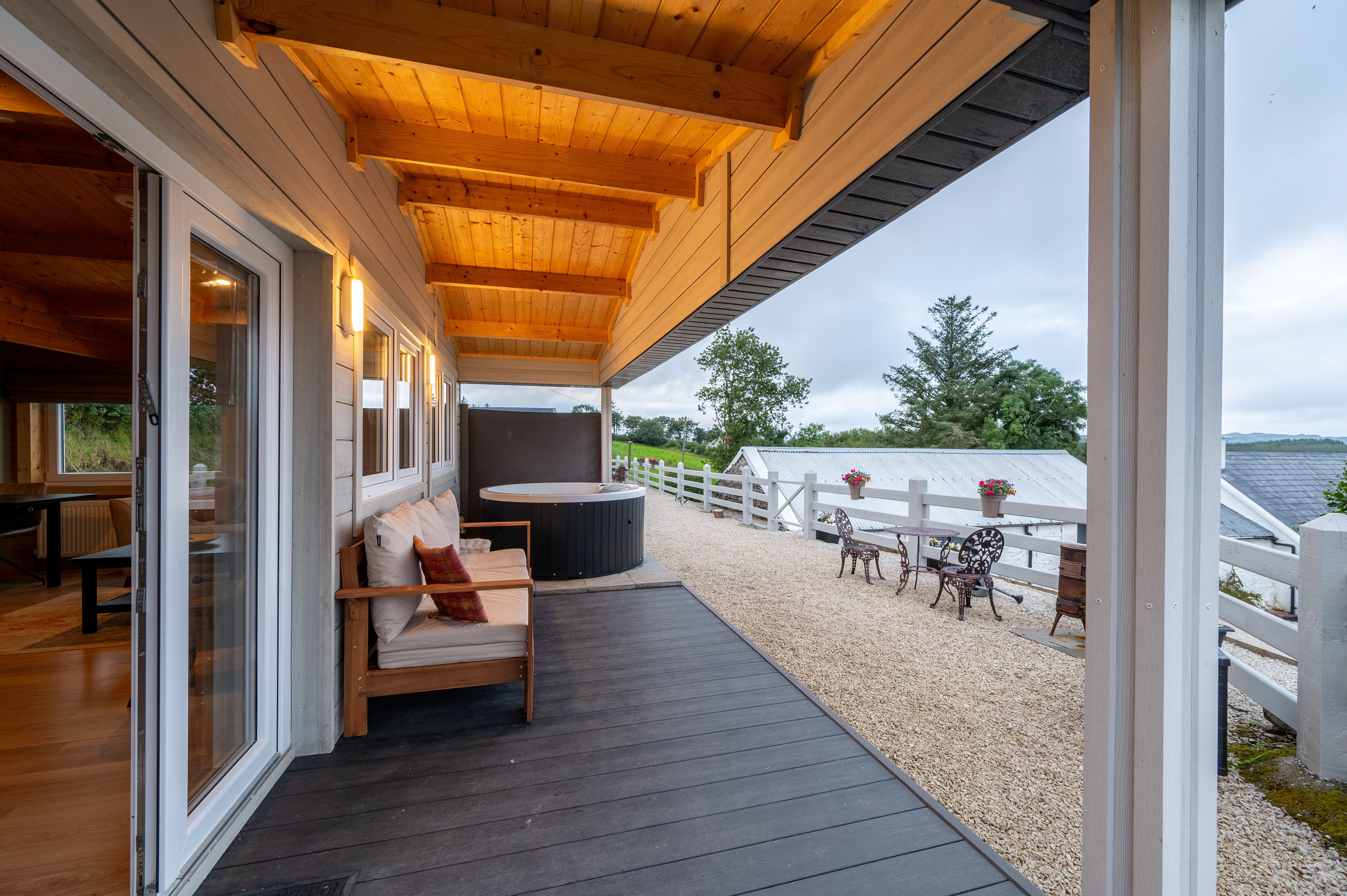 Along Rae’s covered porch toward the outbuildings