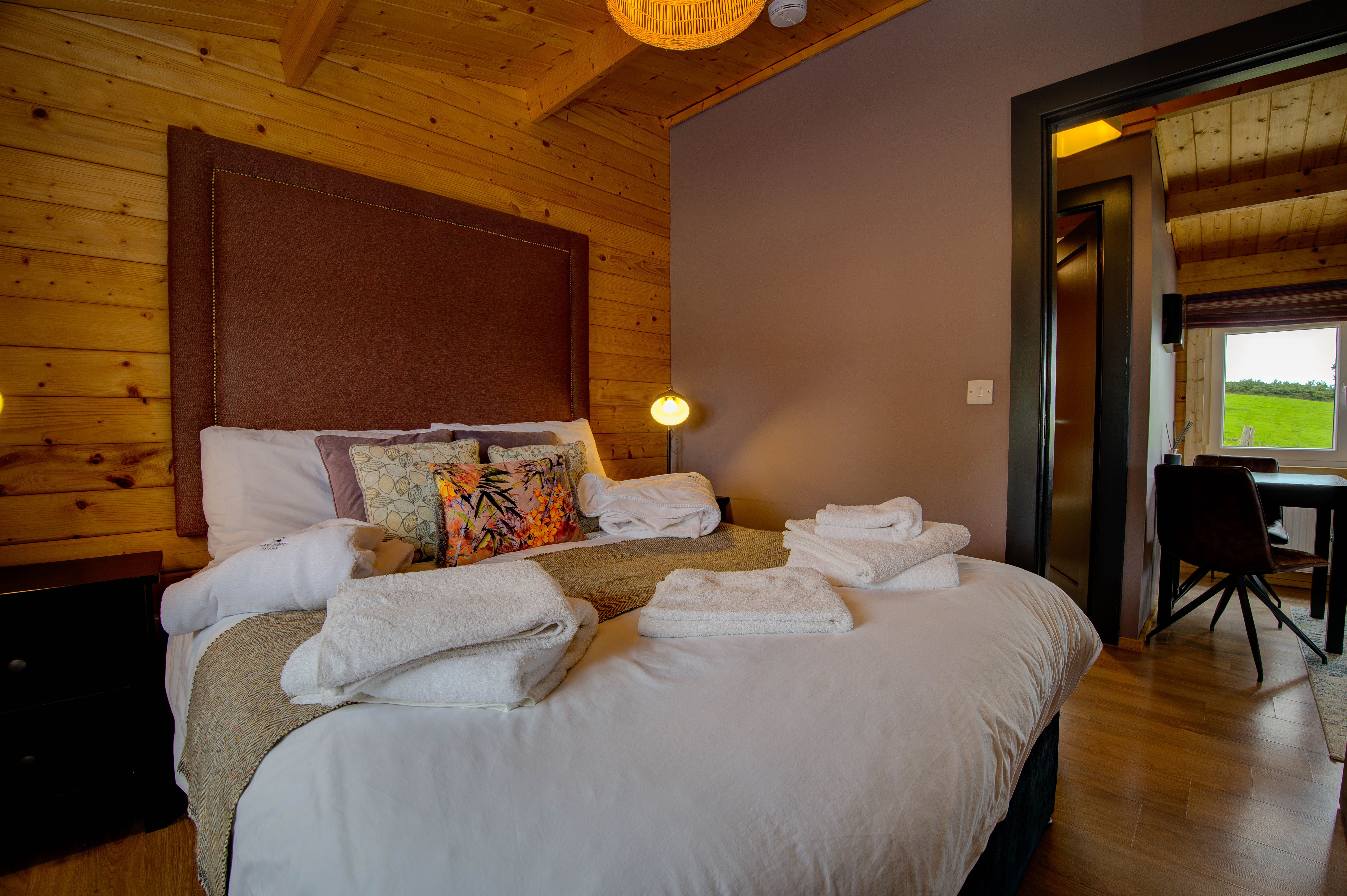 Margaret’s king-size bed with the McNutt tweed headboard