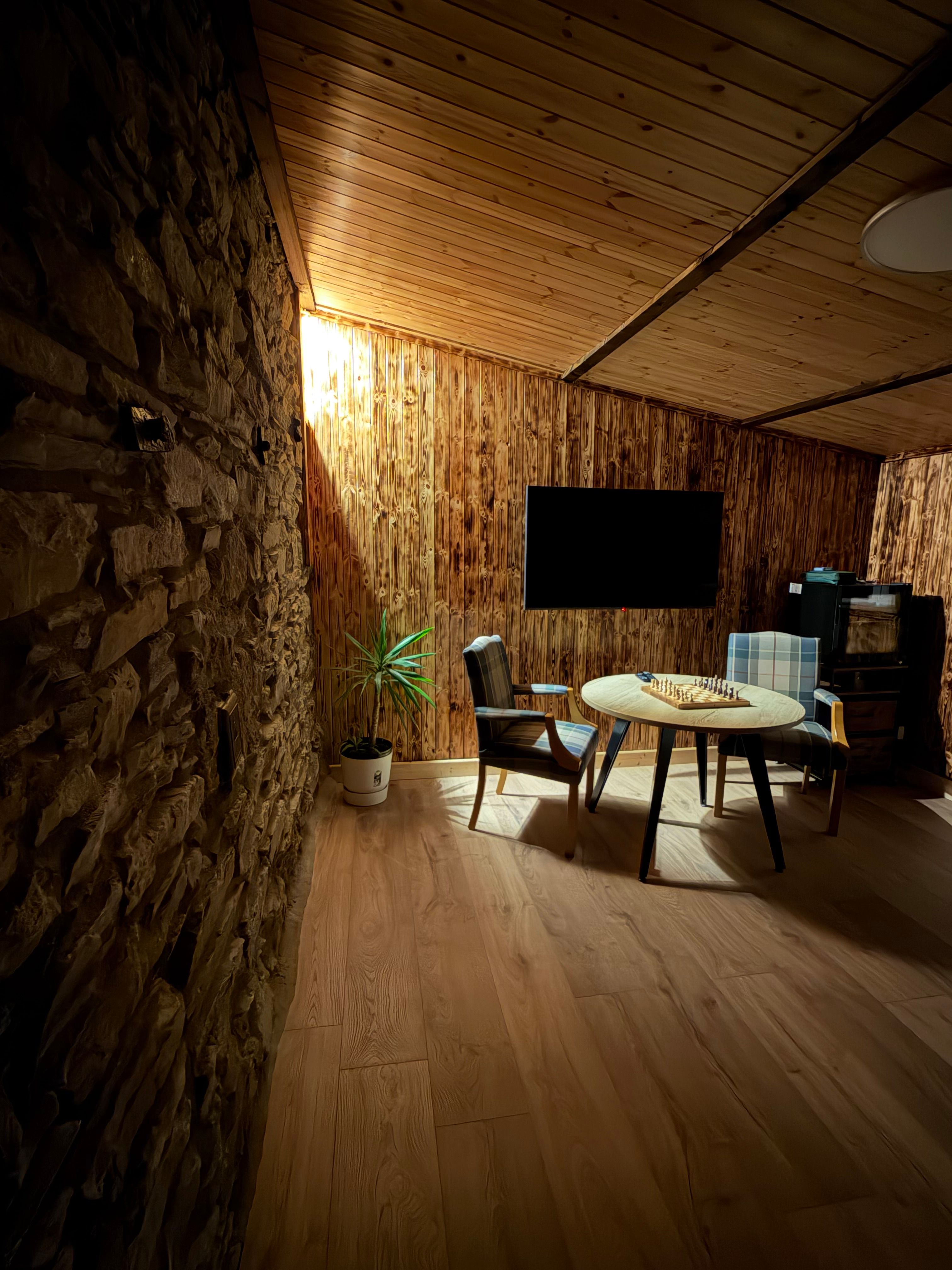The original stone wall feature in the games room
