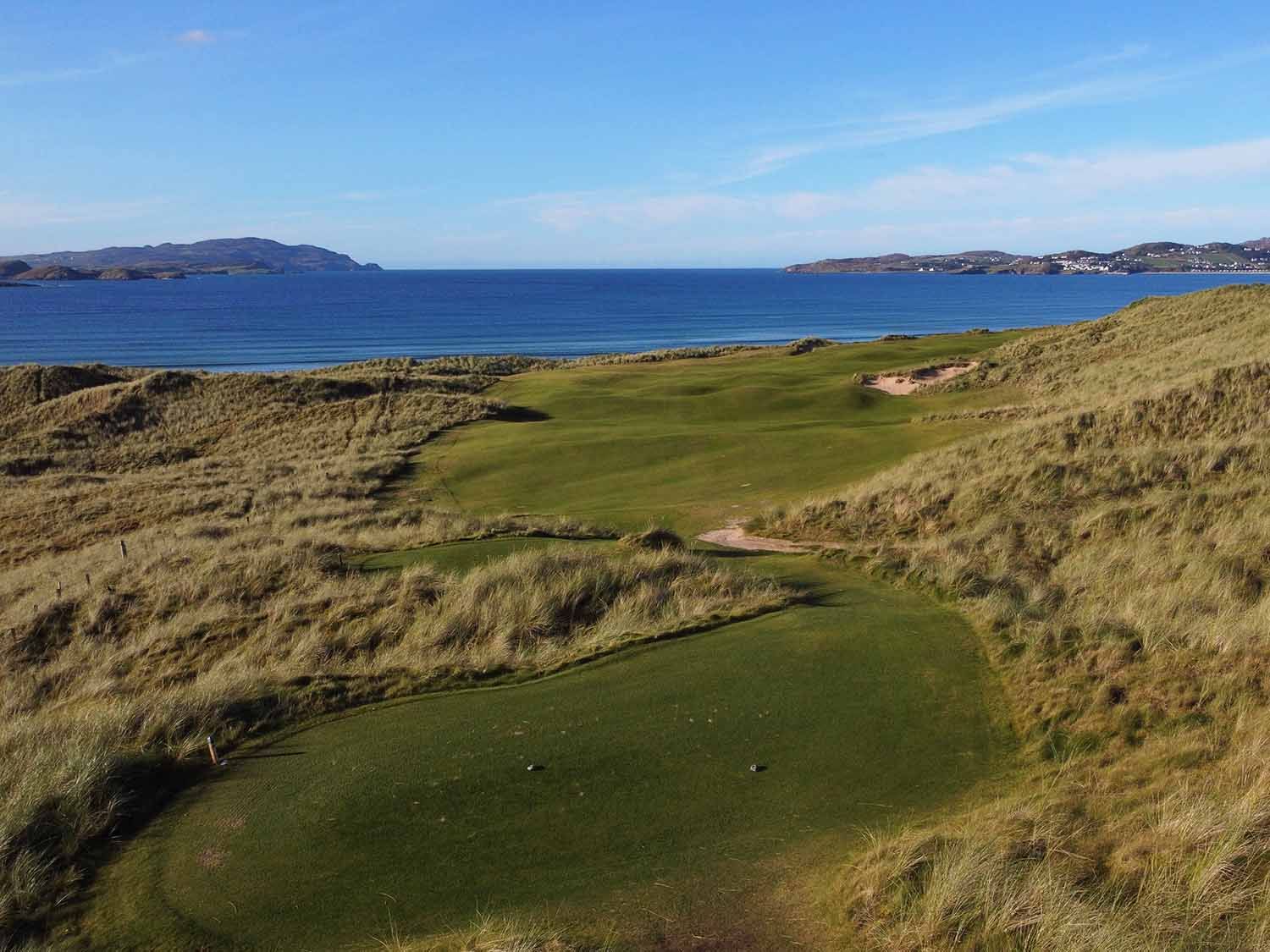 A hole at St Patrick’s Links running toward the bay